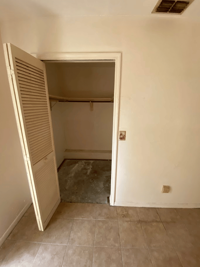 Bedroom closet area cleared during residential cleanout service